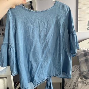 Blue short sleeve, longer crop top w/ knot at the back